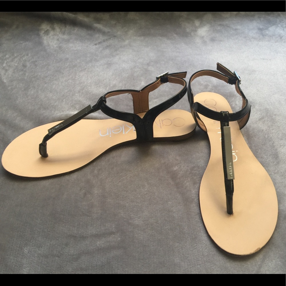 Black and silver Calvin Klein sandals